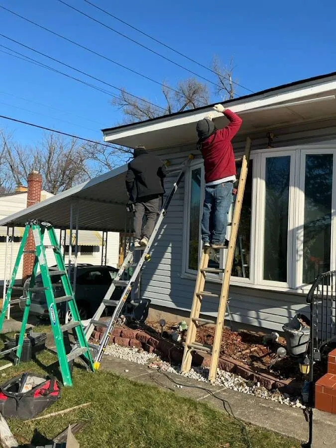 Restoration crew performing exterior repair in Brookville